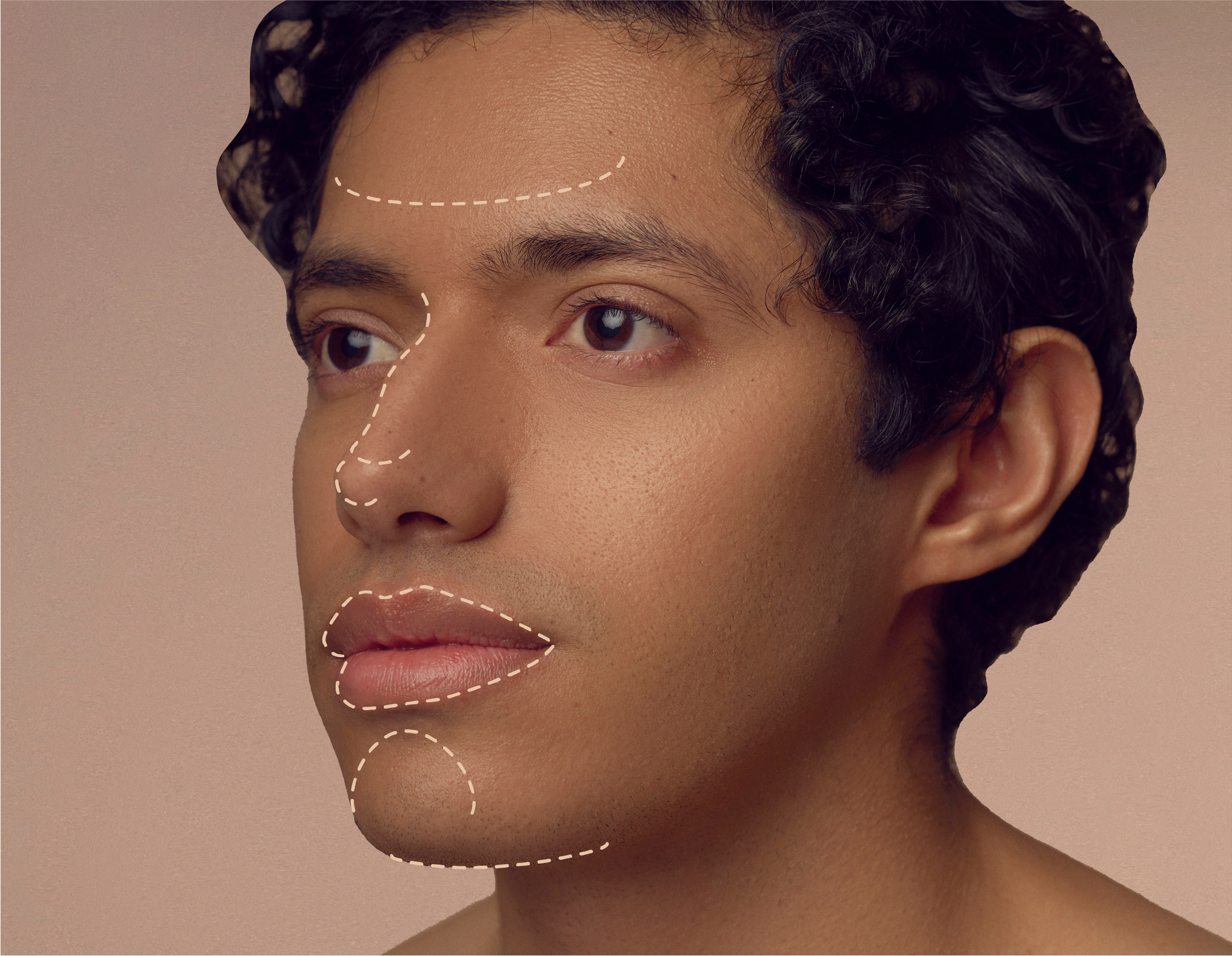 A person with curly hair is shown in close-up with dotted white lines on their face, highlighting areas such as the forehead, nose, and chin. The background is neutral, and the person has a calm expression.